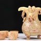 An Elaborate Yellow Jade 'Chi-Dragon' Tripod Ewer With Four 'Chi-Dragon' Cups