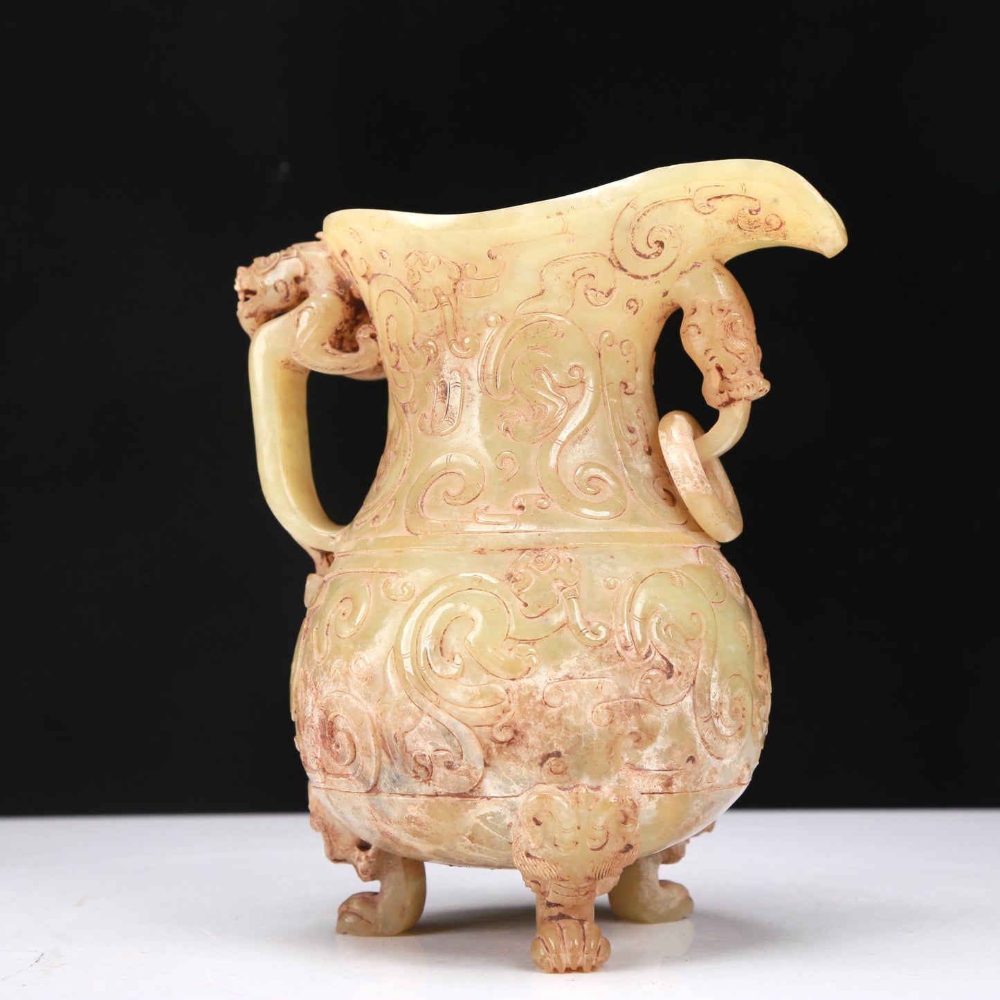 An Elaborate Yellow Jade 'Chi-Dragon' Tripod Ewer With Four 'Chi-Dragon' Cups