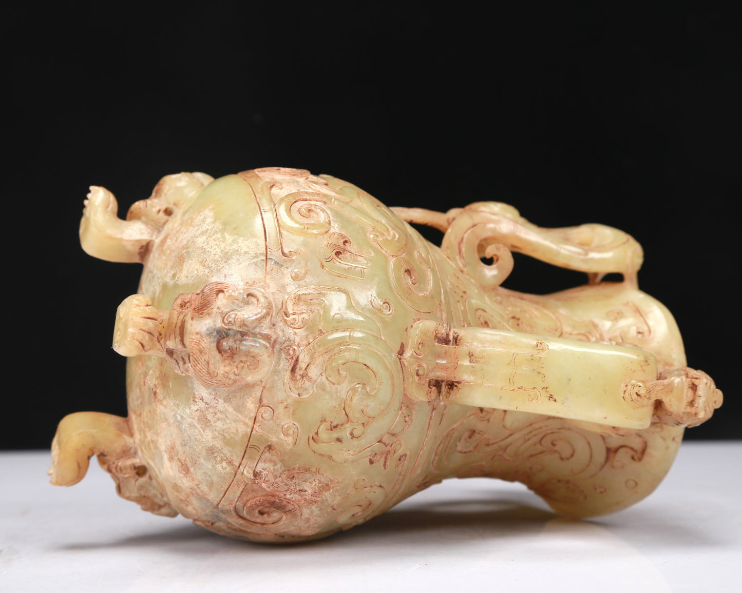 An Elaborate Yellow Jade 'Chi-Dragon' Tripod Ewer With Four 'Chi-Dragon' Cups