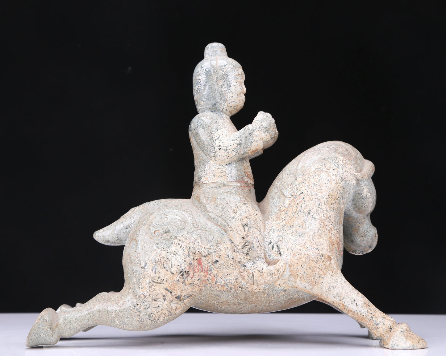 An Excellent White Jade Figure Seated On A Horse