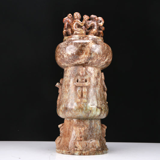 An Elaborate White Jade 'Figure' Jar