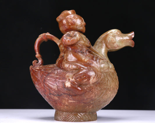 An Excellent White Jade Figure Seated On A Goose