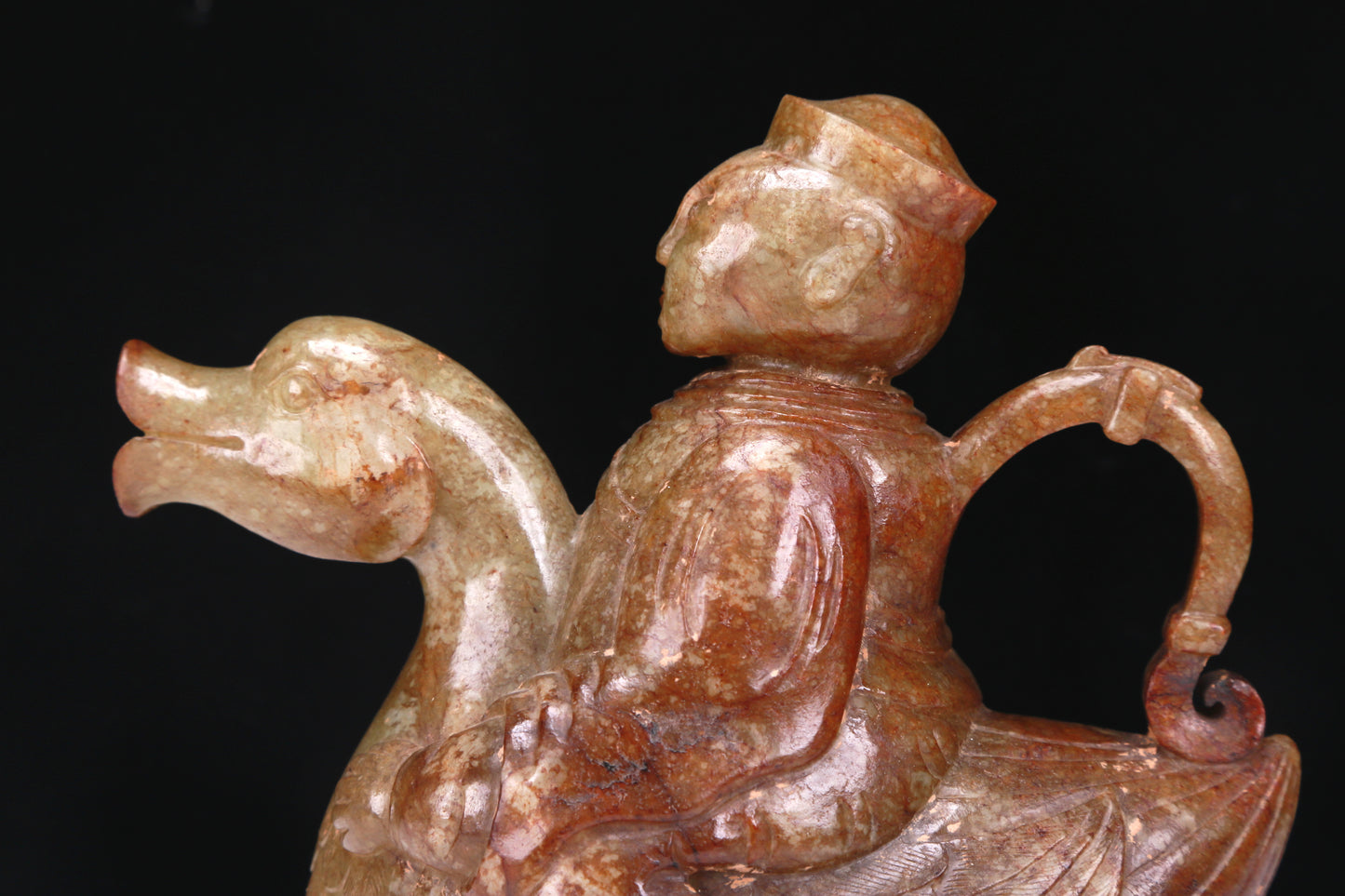 An Excellent White Jade Figure Seated On A Goose