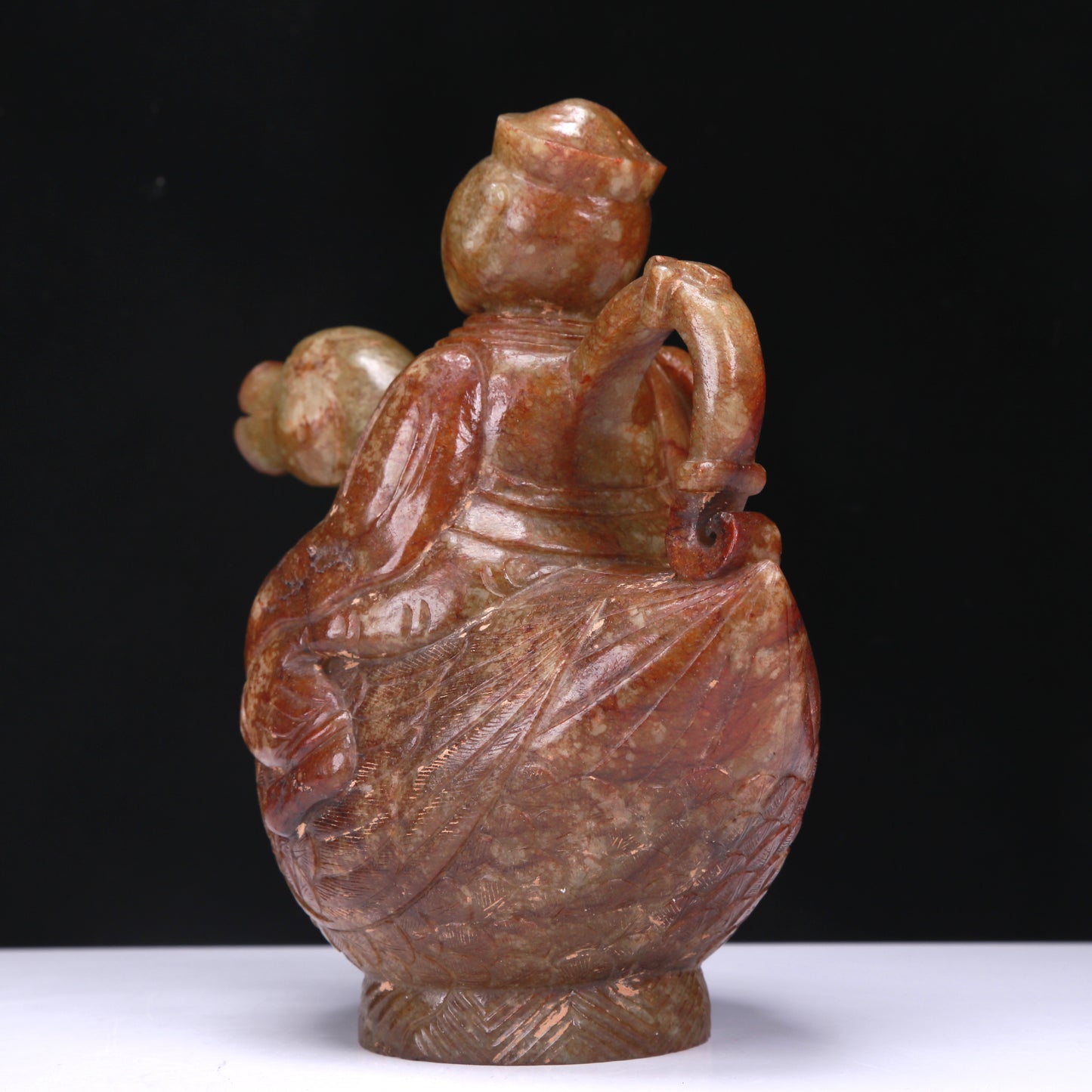 An Excellent White Jade Figure Seated On A Goose