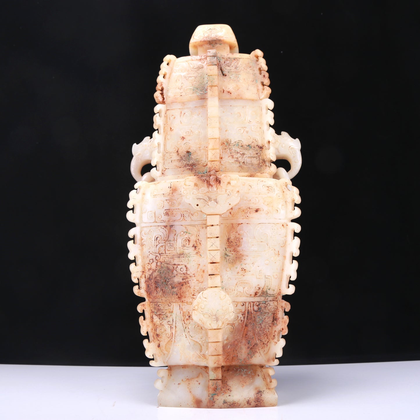 An Elaborate White Jade 'Animal Mask' Vase And Cover