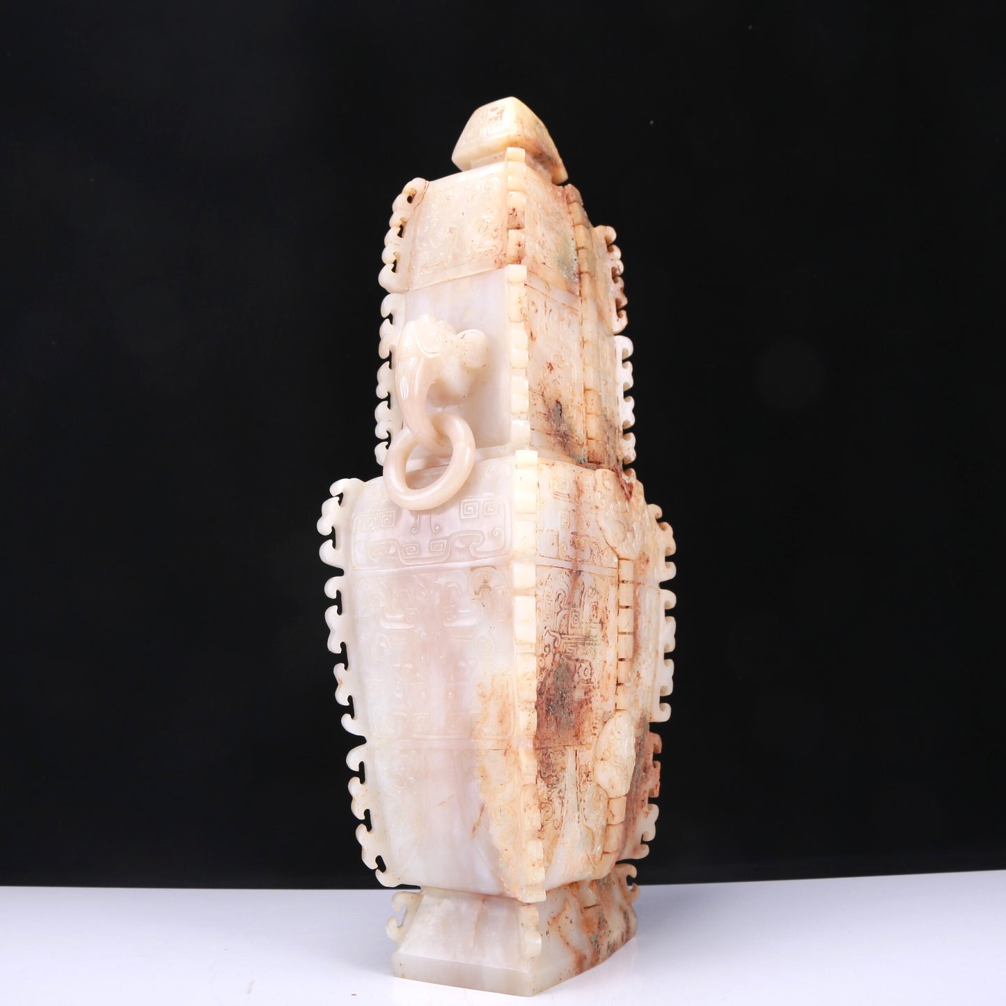 An Elaborate White Jade 'Animal Mask' Vase And Cover