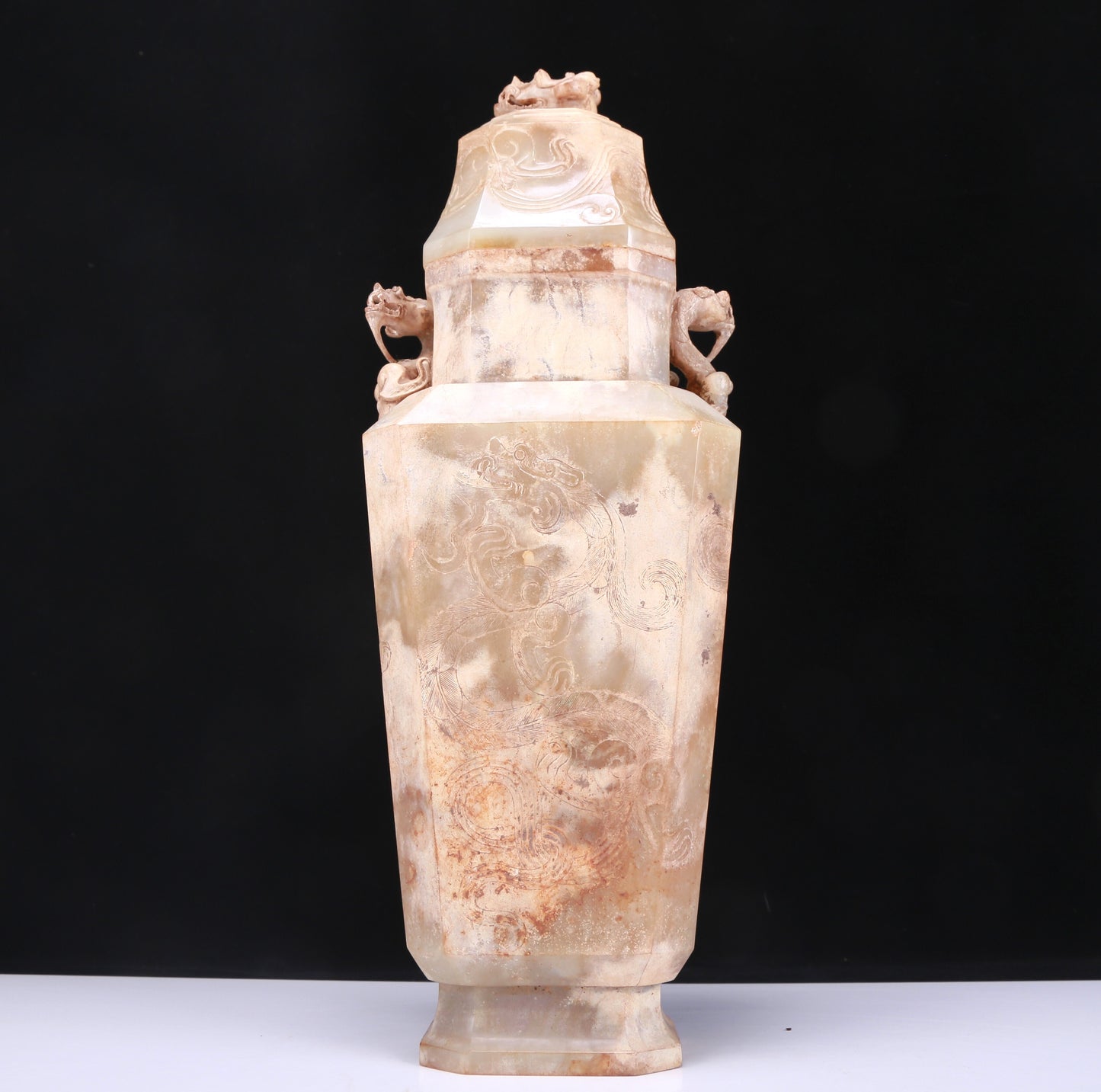 An Elaborate White Jade 'Dragon' Vase And Cover