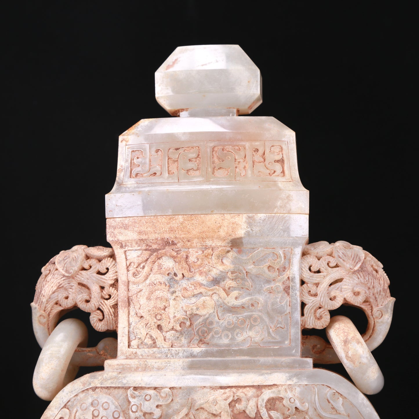 An Elaborate White Jade 'Hunting' Flower-Handled Vase And Cover