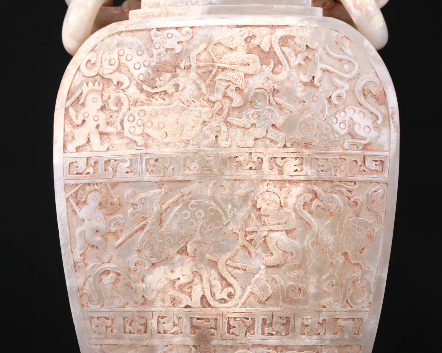 An Elaborate White Jade 'Hunting' Flower-Handled Vase And Cover