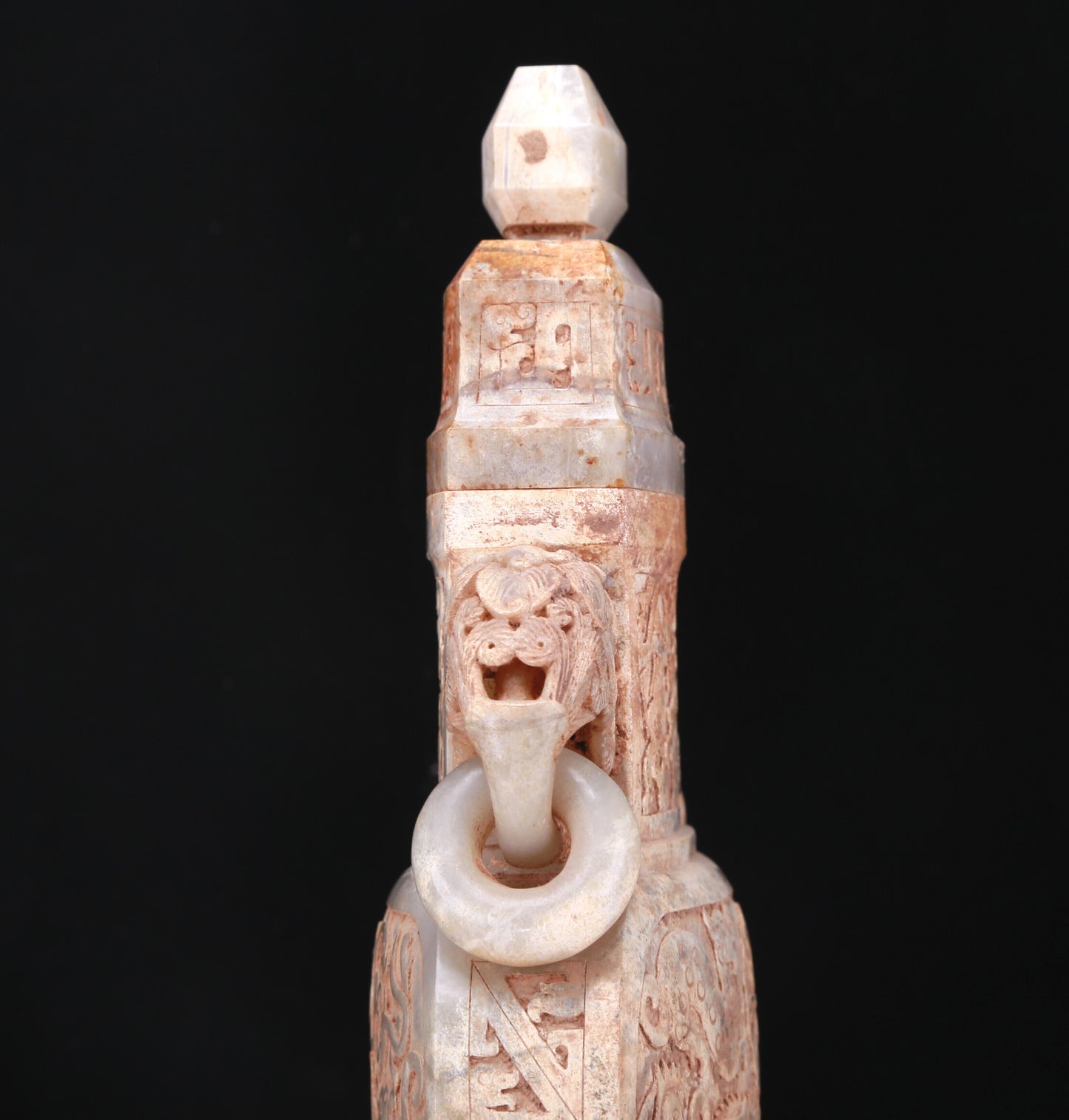 An Elaborate White Jade 'Hunting' Flower-Handled Vase And Cover