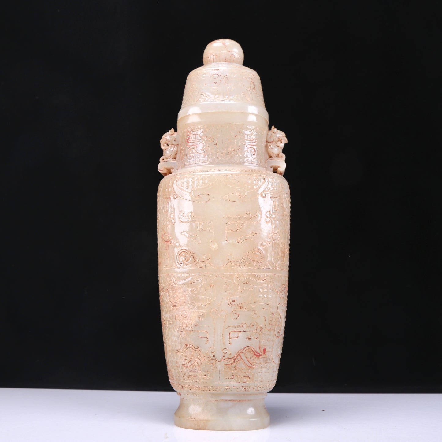 An Elaborate White Jade 'Animal Mask' Vase And Cover