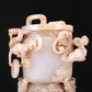 An Elaborate White Jade 'Chi-Dragon' Tripod Censer