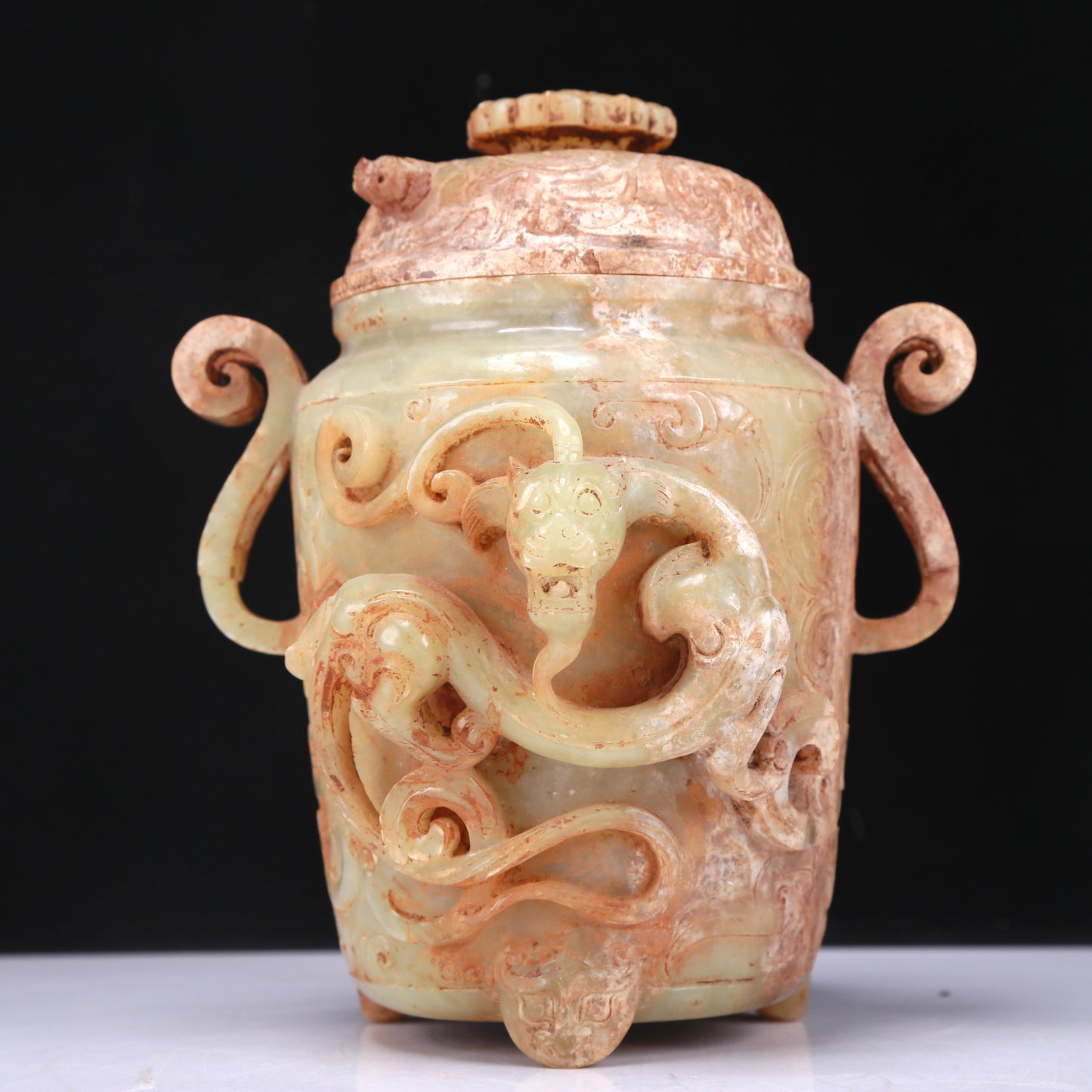 An Elaborate White Jade 'Dragon' Tripod Jar