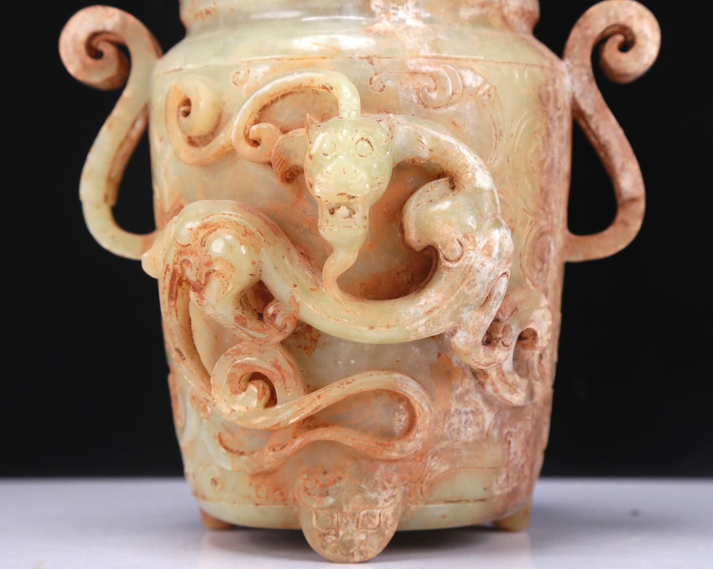 An Elaborate White Jade 'Dragon' Tripod Jar