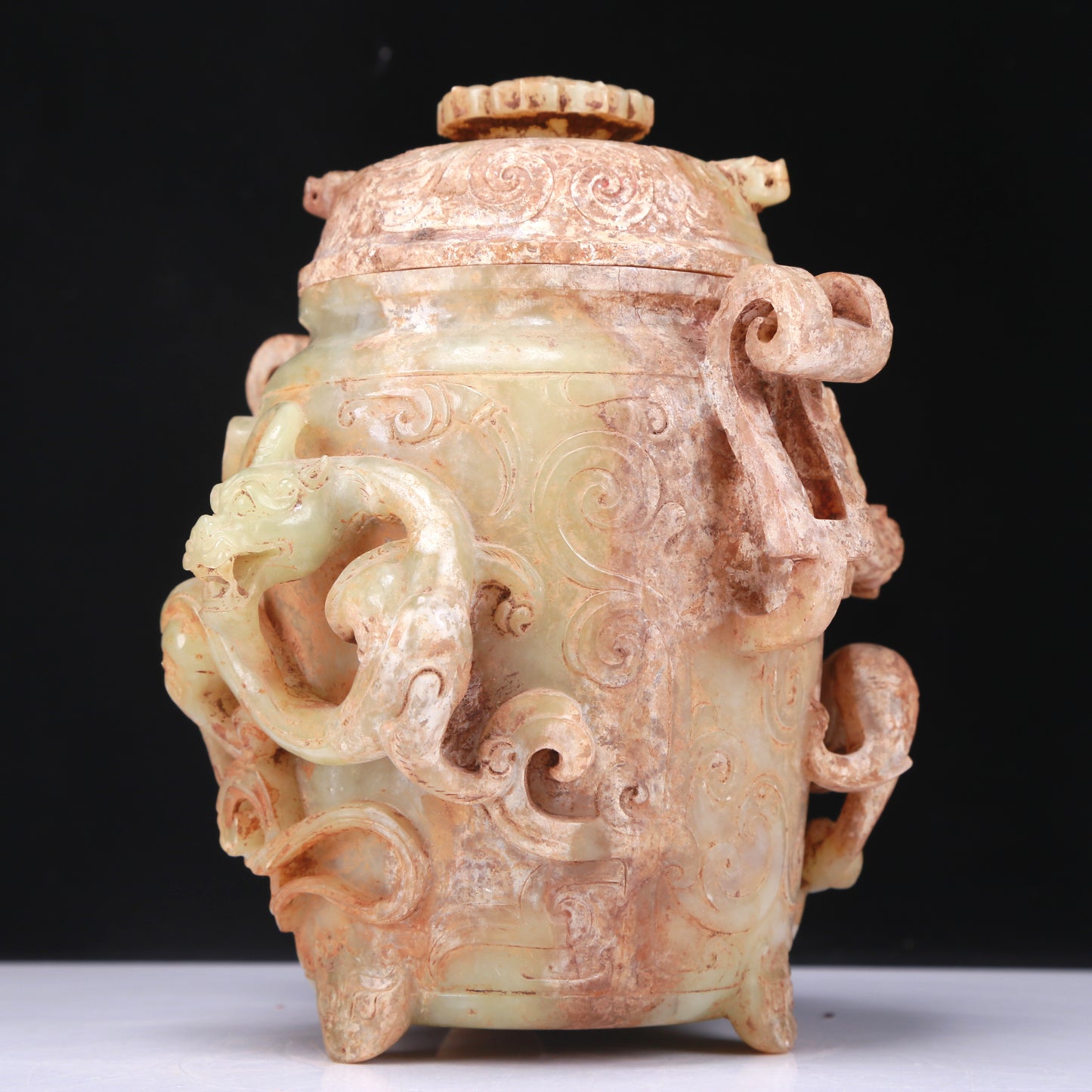 An Elaborate White Jade 'Dragon' Tripod Jar