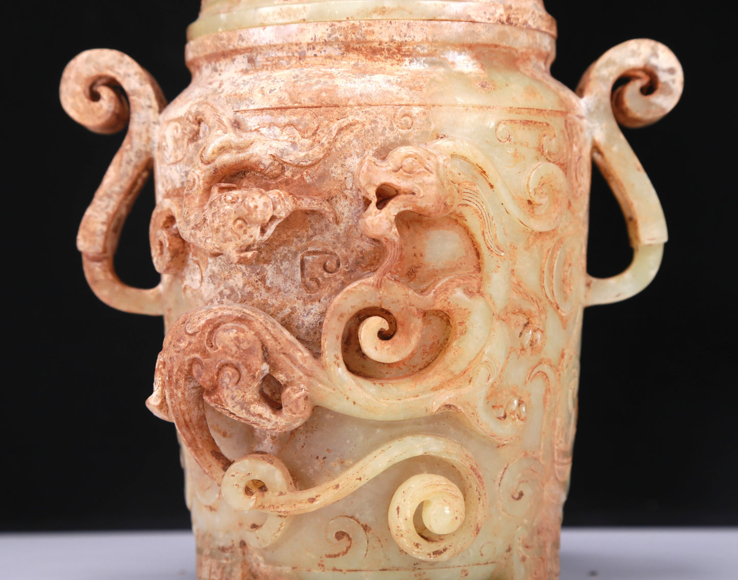 An Elaborate White Jade 'Dragon' Tripod Jar