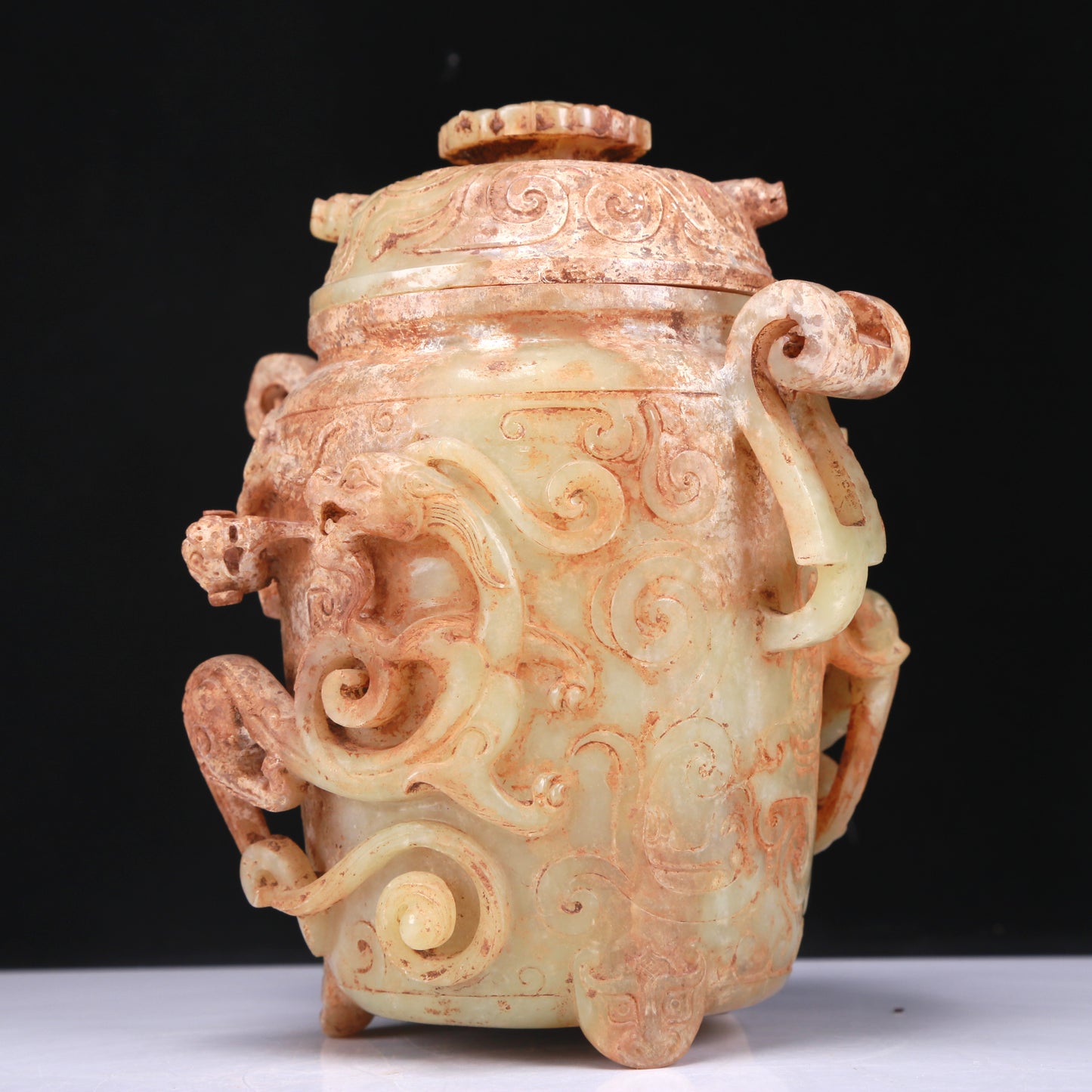 An Elaborate White Jade 'Dragon' Tripod Jar