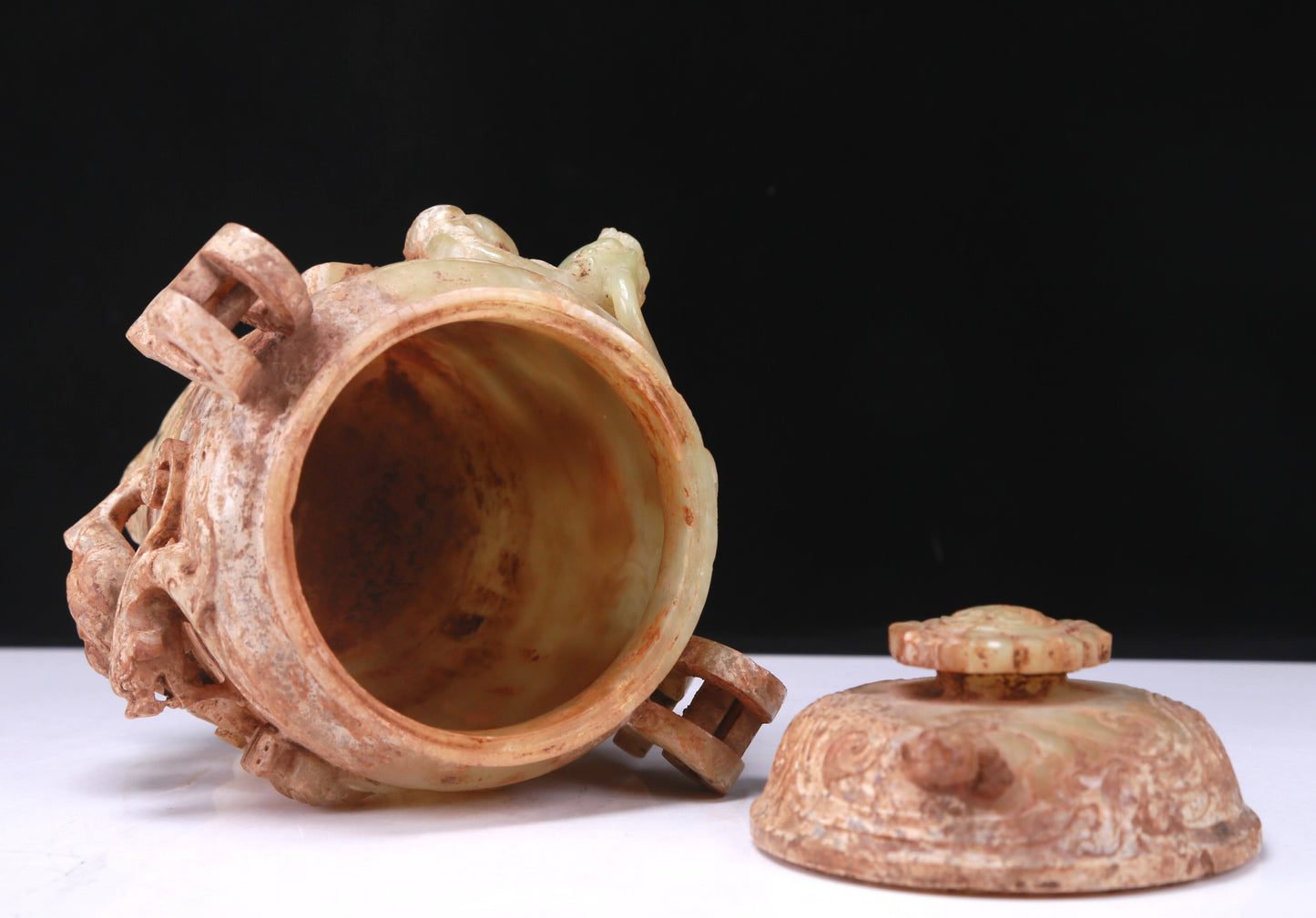 An Elaborate White Jade 'Dragon' Tripod Jar