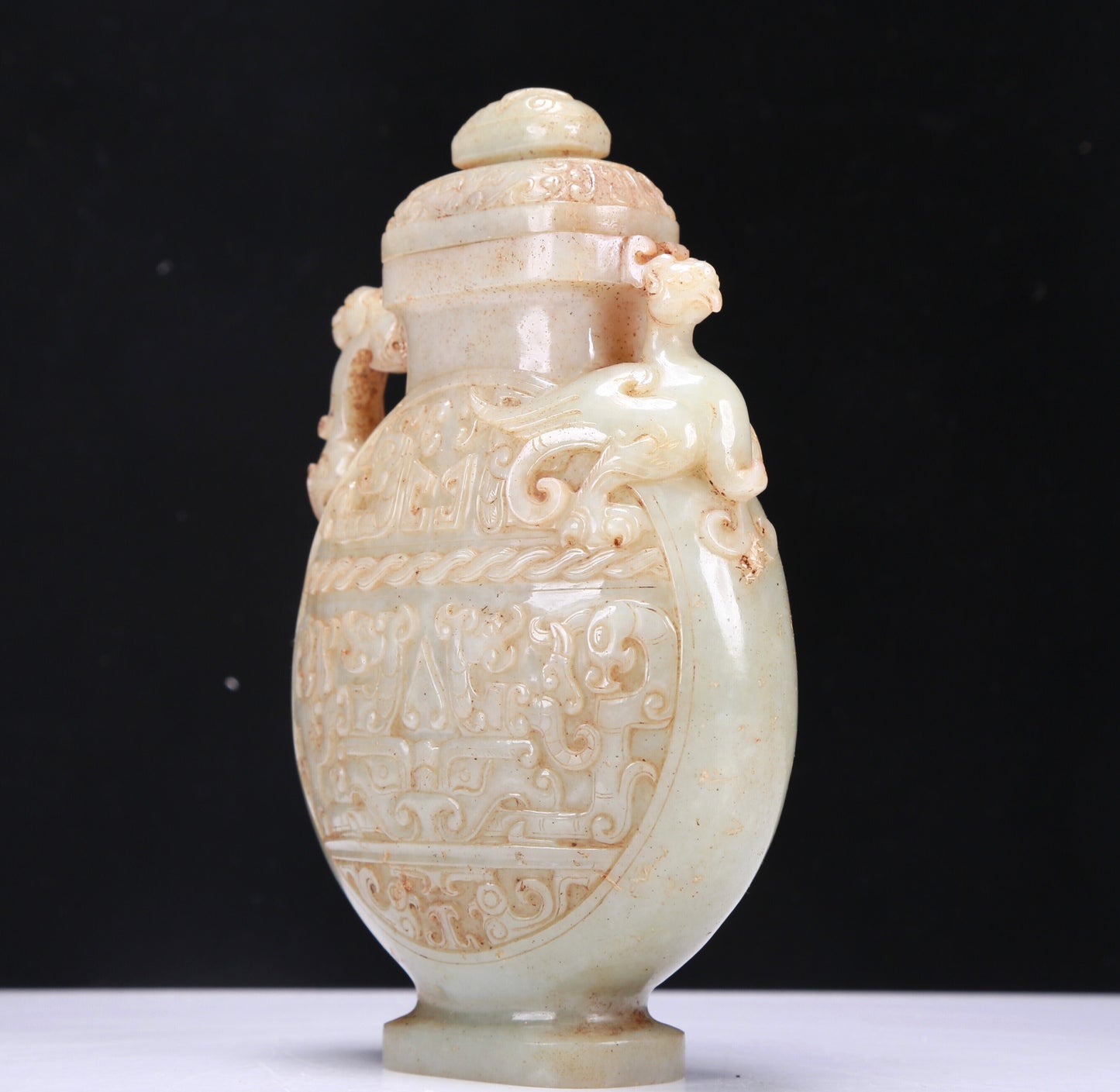 A Fabulous White Jade 'Animal Mask' Dragon& Phoenix-Handled Vase And Cover