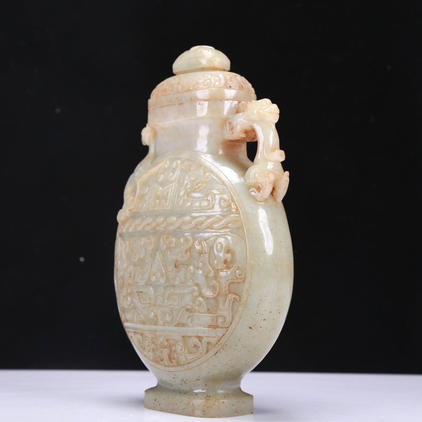 A Fabulous White Jade 'Animal Mask' Dragon& Phoenix-Handled Vase And Cover