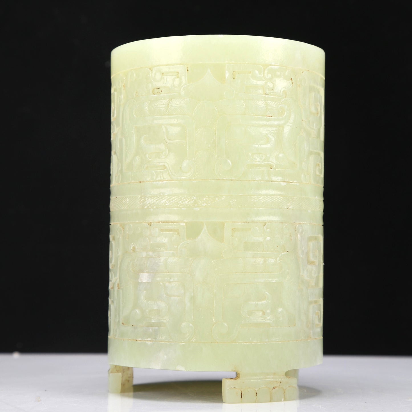 A Fabulous Yellow Jade 'Animal Mask' Tripod Brush Pot