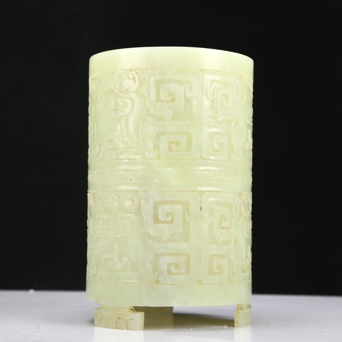 A Fabulous Yellow Jade 'Animal Mask' Tripod Brush Pot