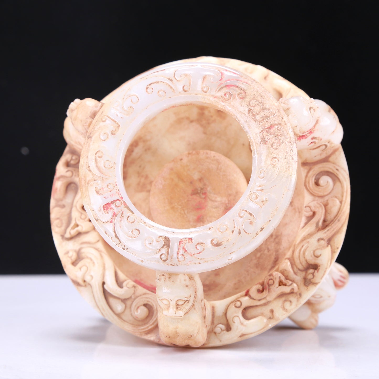 A Fabulous White Jade 'Auspicious Beast' Cup