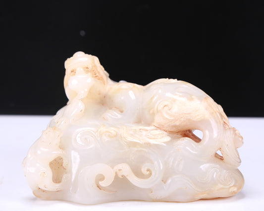 A Fabulous White Jade Auspicious Beast Group