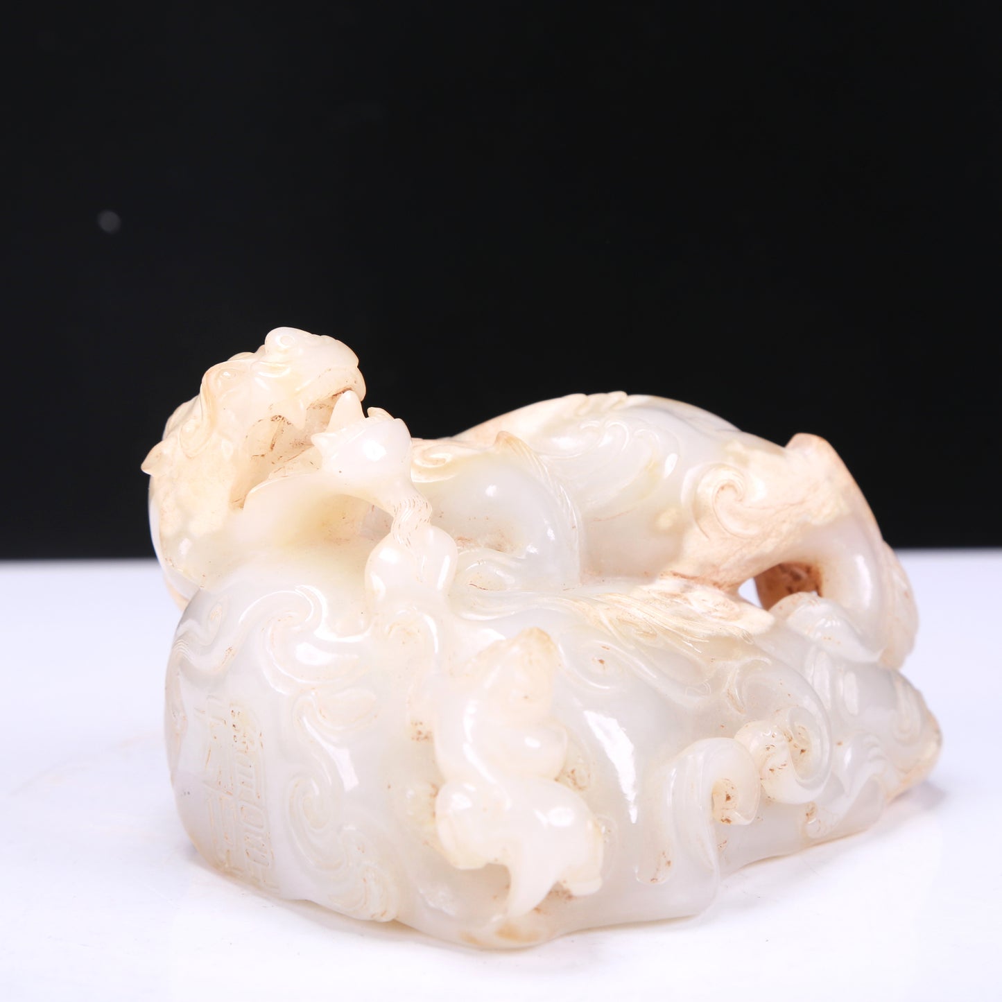 A Fabulous White Jade Auspicious Beast Group