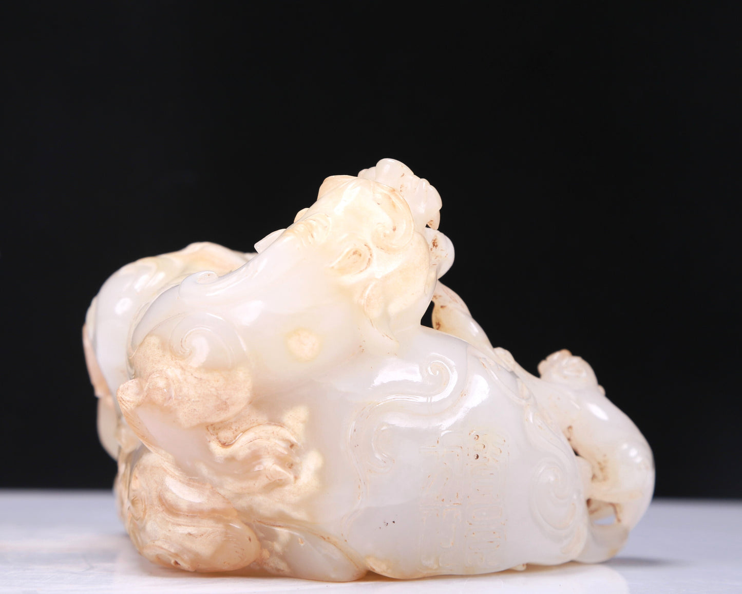 A Fabulous White Jade Auspicious Beast Group