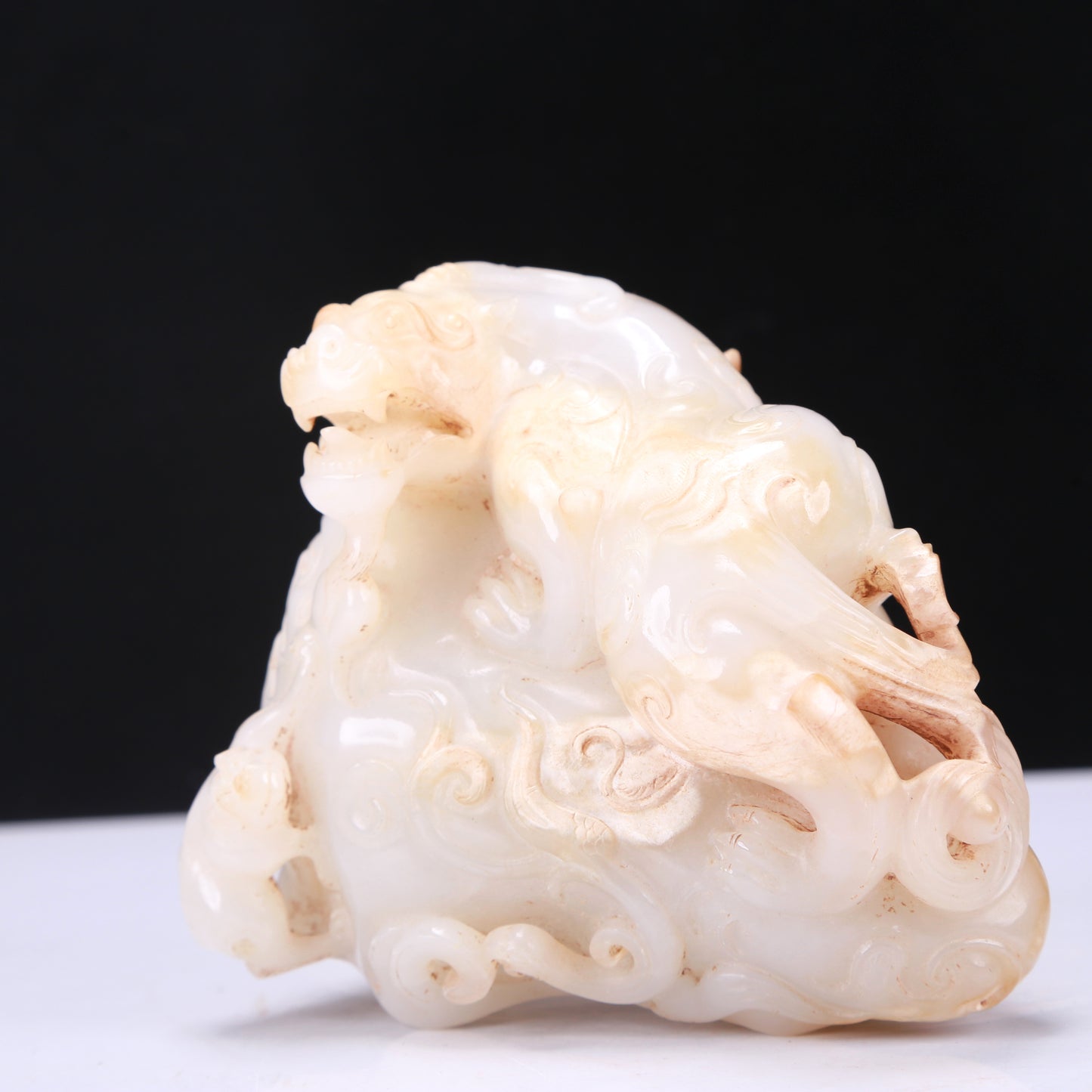 A Fabulous White Jade Auspicious Beast Group