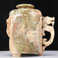 An Archaic Yellow Jade 'Dragon' Tripod Jar And Cover