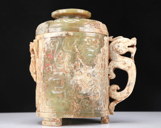 An Archaic Yellow Jade 'Dragon' Tripod Jar And Cover