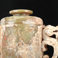 An Archaic Yellow Jade 'Dragon' Tripod Jar And Cover