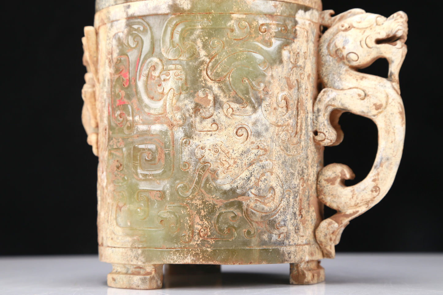 An Archaic Yellow Jade 'Dragon' Tripod Jar And Cover