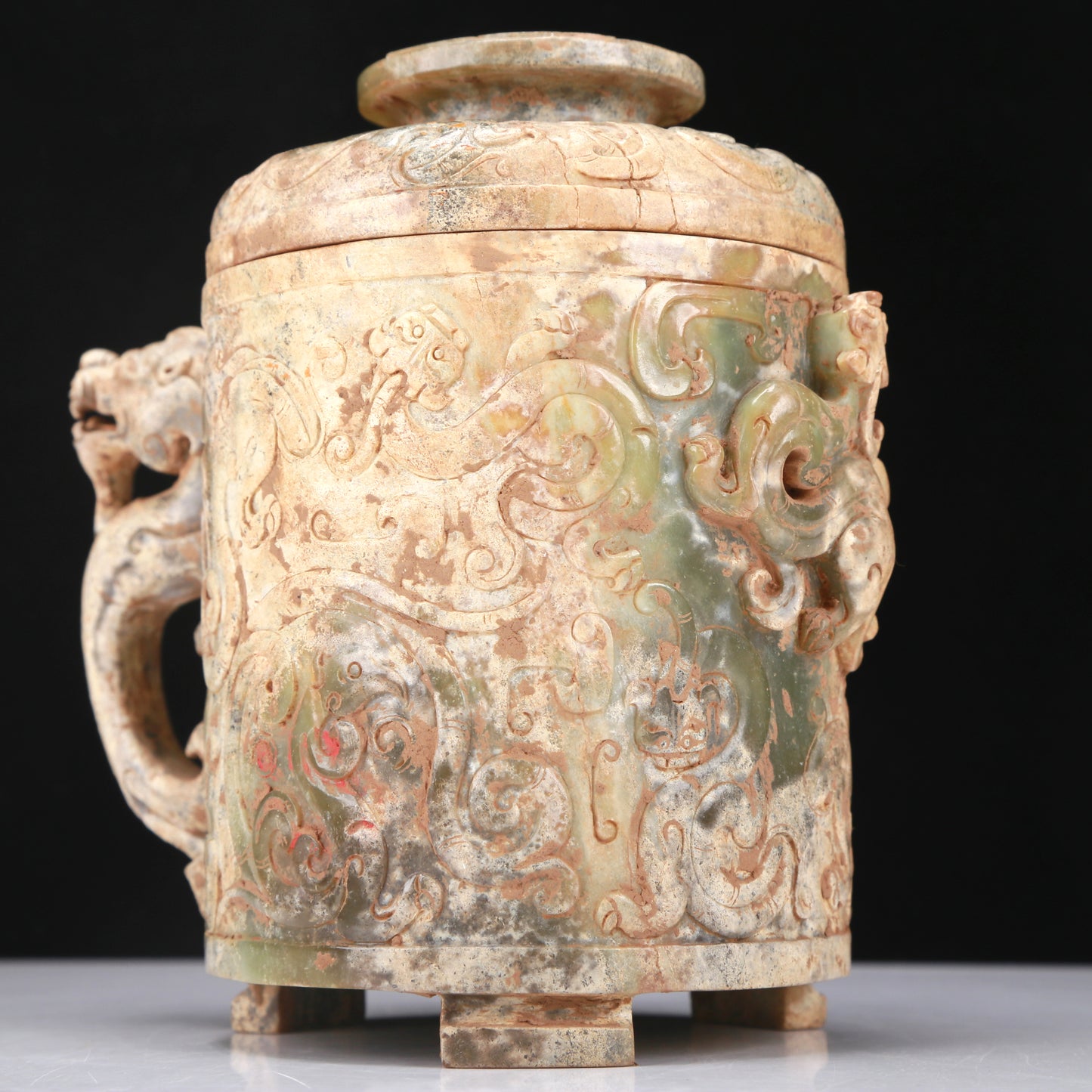 An Archaic Yellow Jade 'Dragon' Tripod Jar And Cover