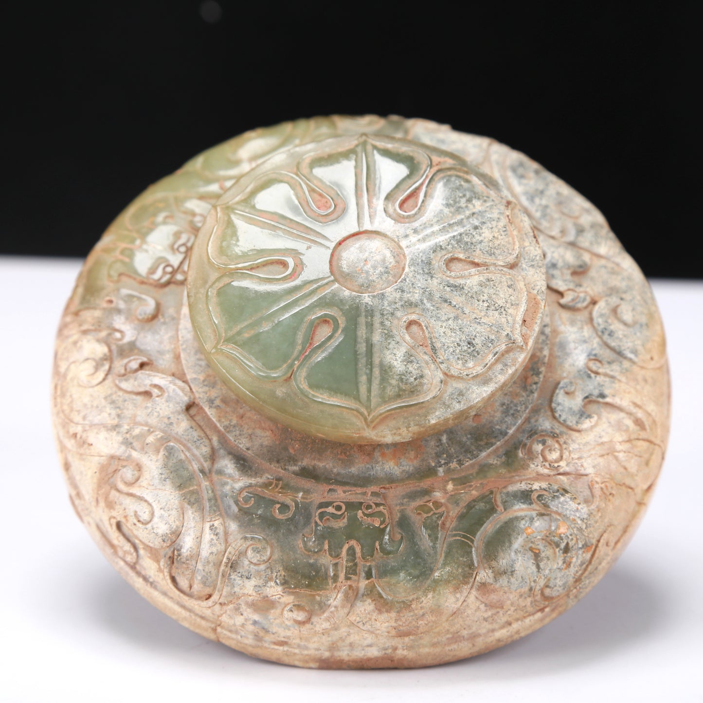 An Archaic Yellow Jade 'Dragon' Tripod Jar And Cover