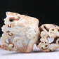 An Excellent White Jade 'Chi-Dragon' Ornament