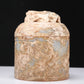 An Archaic White Jade 'Auspicious Beast' Jar And Cover