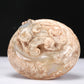 An Archaic White Jade 'Auspicious Beast' Jar And Cover