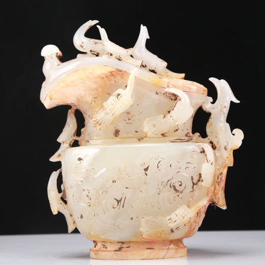 An Archaic White Jade 'Mythical Bird' Ewer