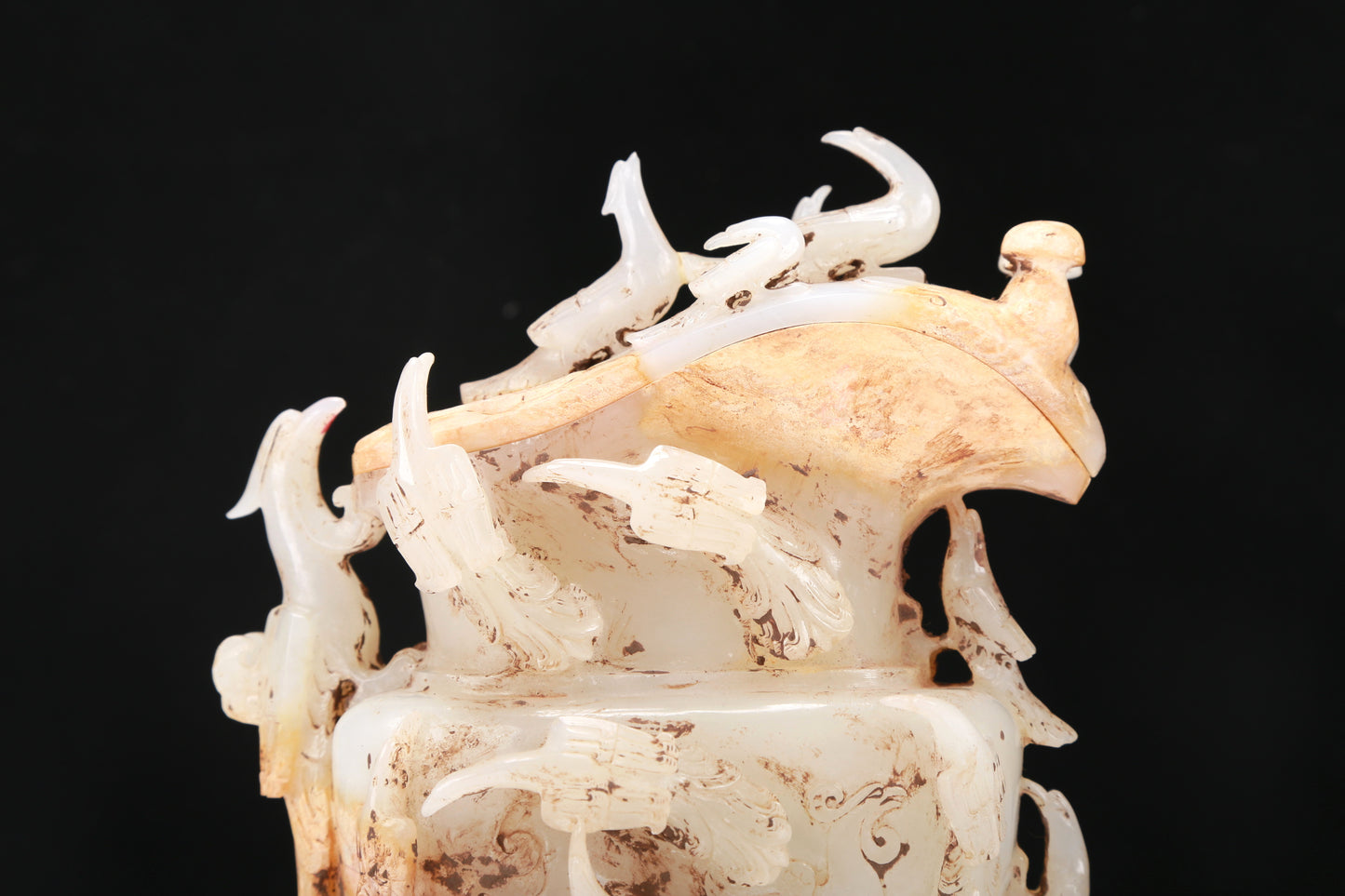 An Archaic White Jade 'Mythical Bird' Ewer