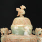 An Archaic Celadon-White Jade 'Animal Mask' Dragon-Handled Vase And Cover