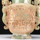 An Archaic Celadon-White Jade 'Animal Mask' Dragon-Handled Vase And Cover