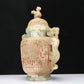 An Archaic Celadon-White Jade 'Animal Mask' Dragon-Handled Vase And Cover