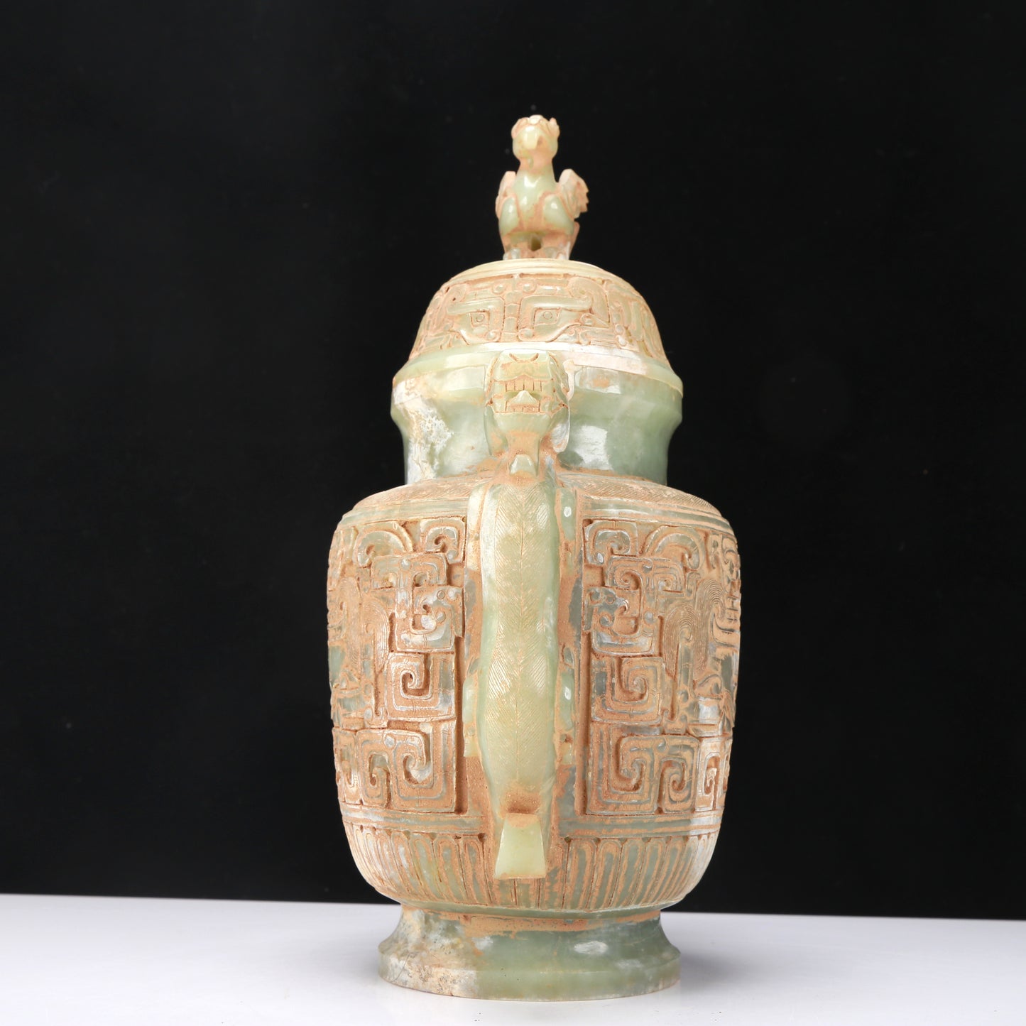 An Archaic Celadon-White Jade 'Animal Mask' Dragon-Handled Vase And Cover