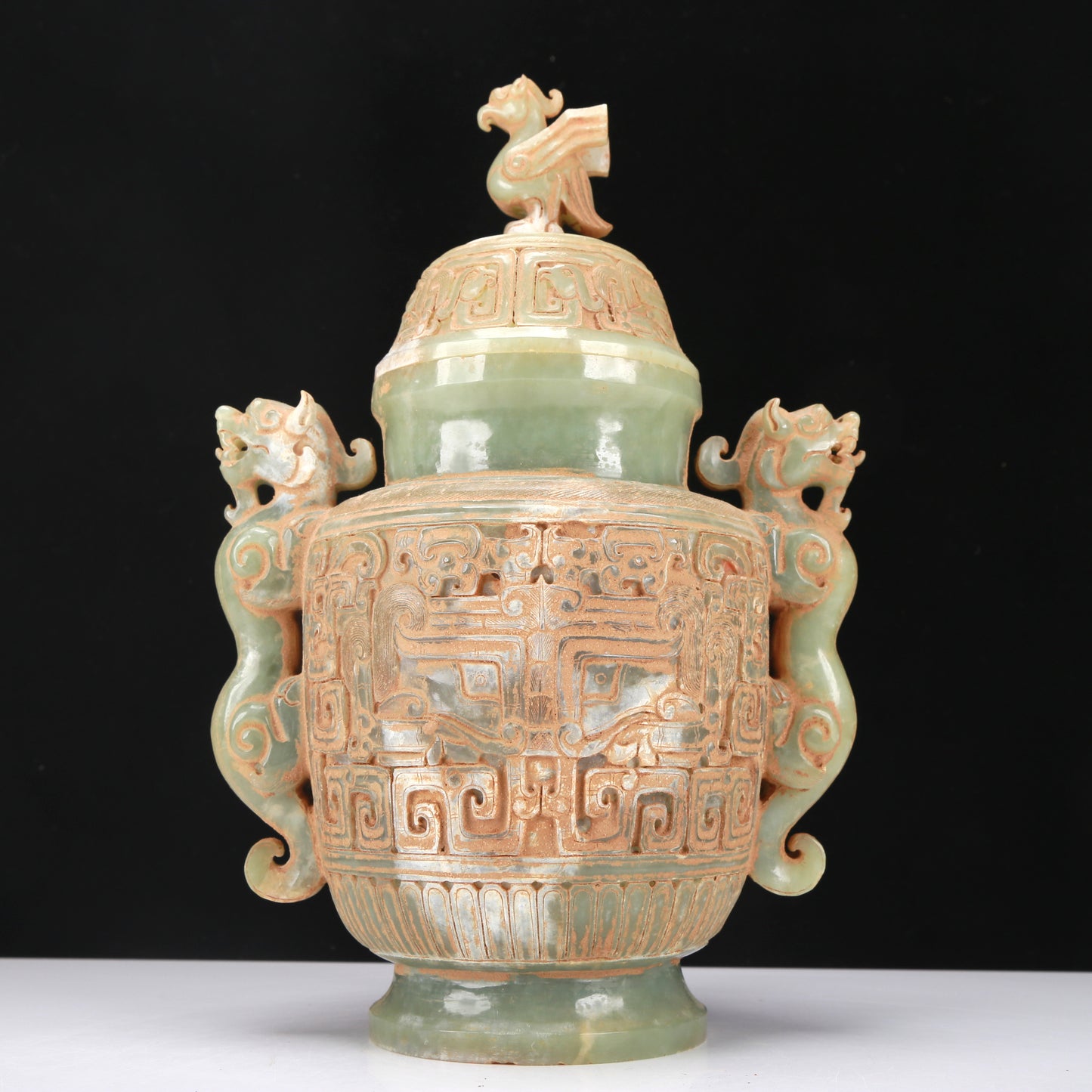 An Archaic Celadon-White Jade 'Animal Mask' Dragon-Handled Vase And Cover