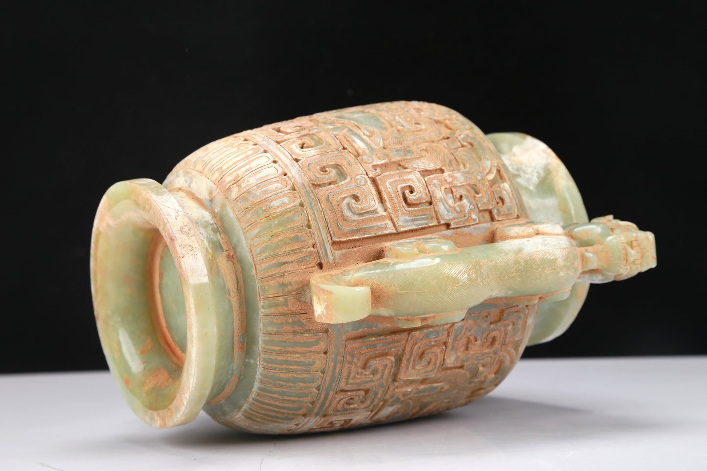 An Archaic Celadon-White Jade 'Animal Mask' Dragon-Handled Vase And Cover