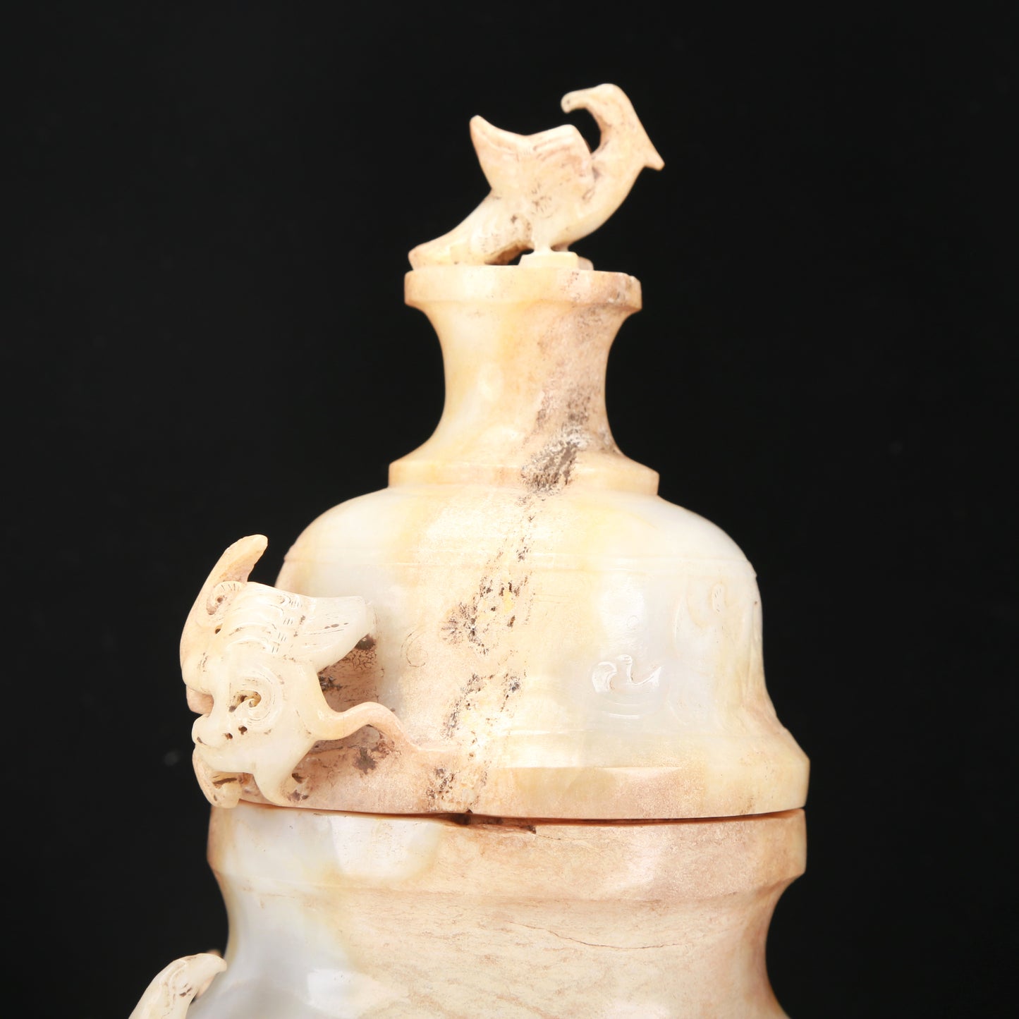 An Archaic White Jade 'Bird' Vase And Cover