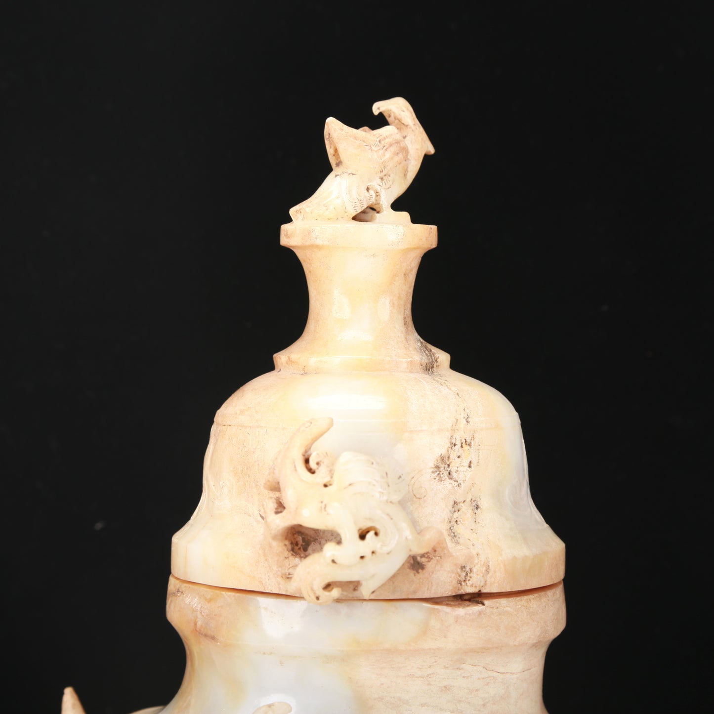 An Archaic White Jade 'Bird' Vase And Cover